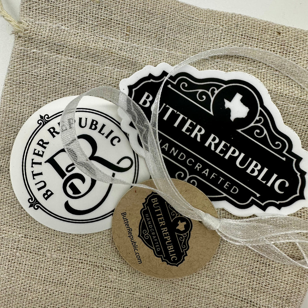 Butter Republic branded product tags on a textured fabric background
