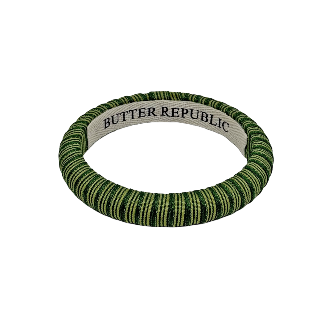A green striped Butter Republic bracelet