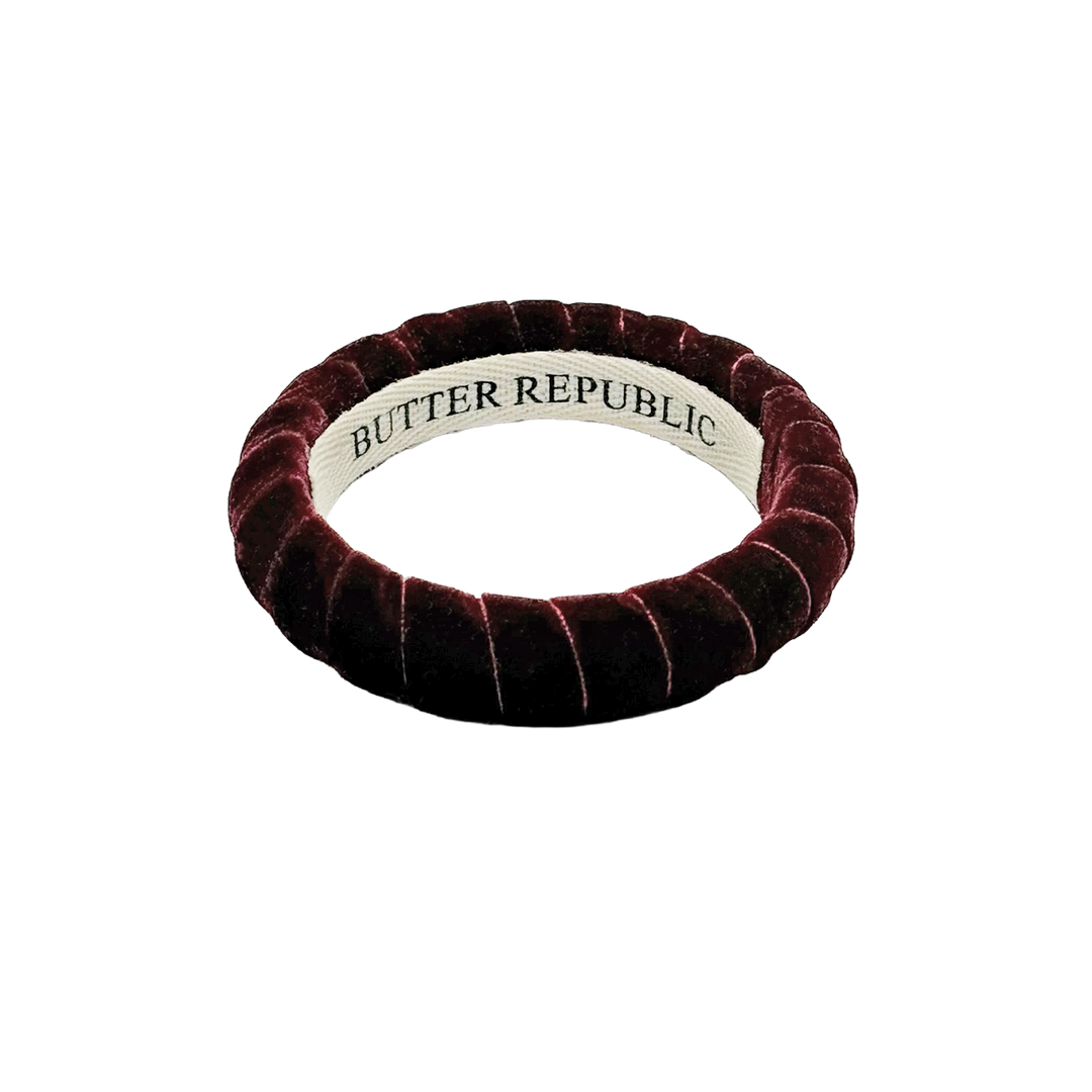 Maroon velvet bracelet with 'Butter Republic' branding on a white background