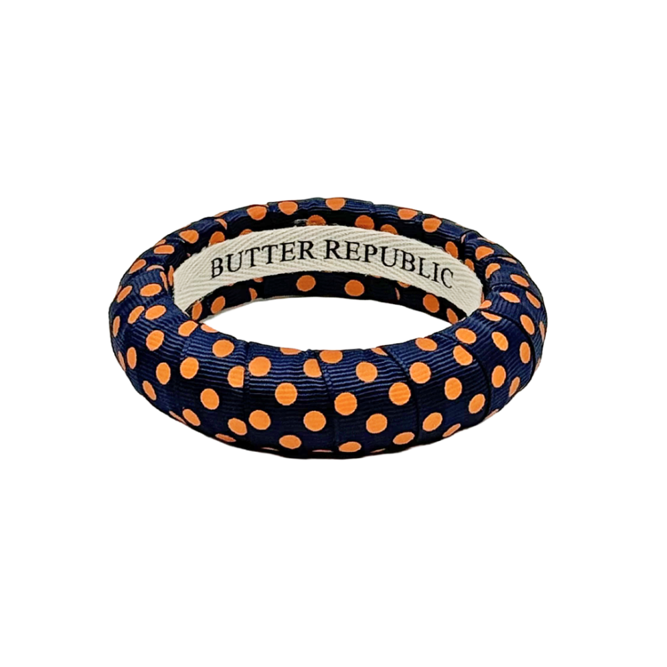 Navy blue medium Butter Republic bracelet with orange polka dots
