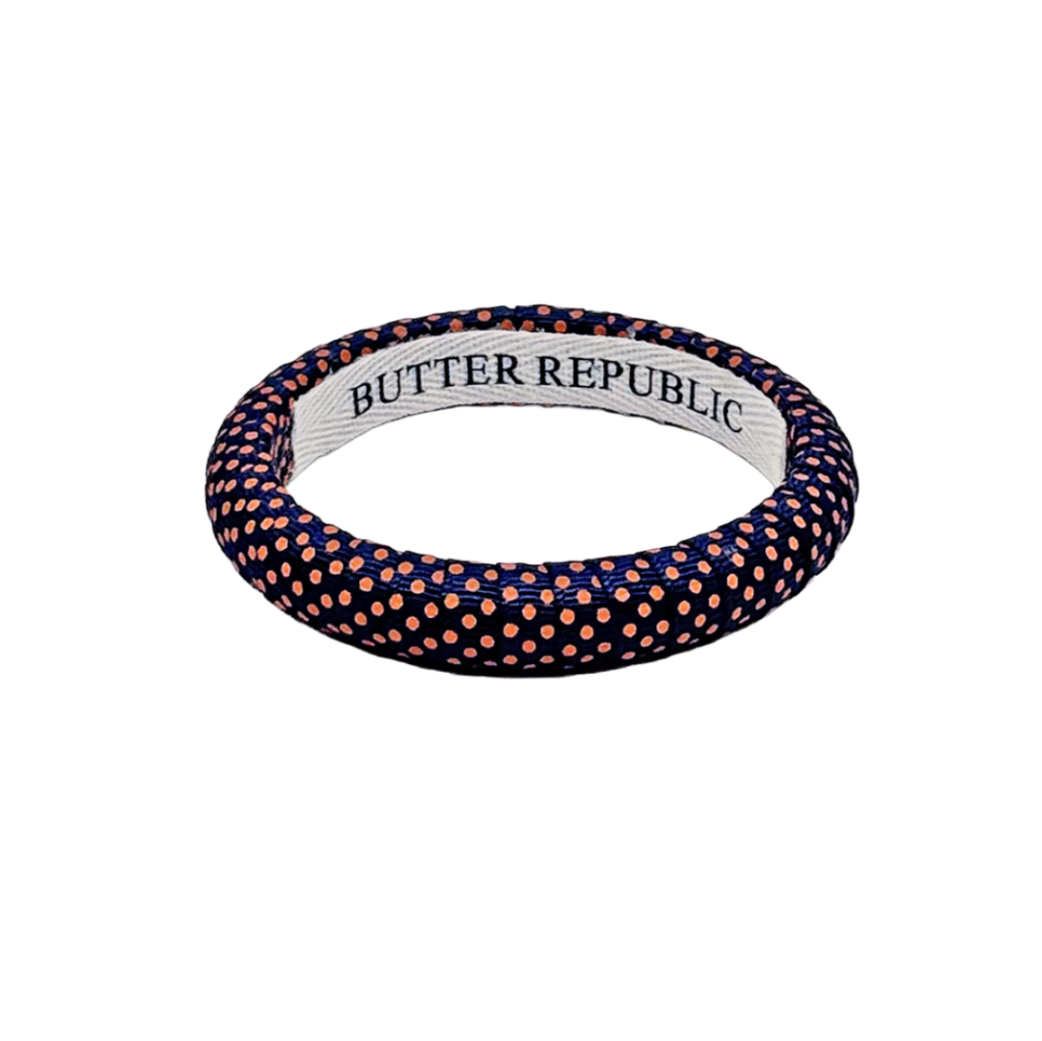 Narrow navy blue and orange polka dot Butter Republic bracelet