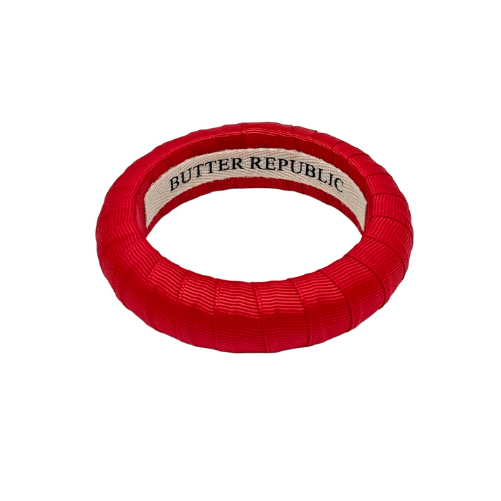 Red bracelet with &