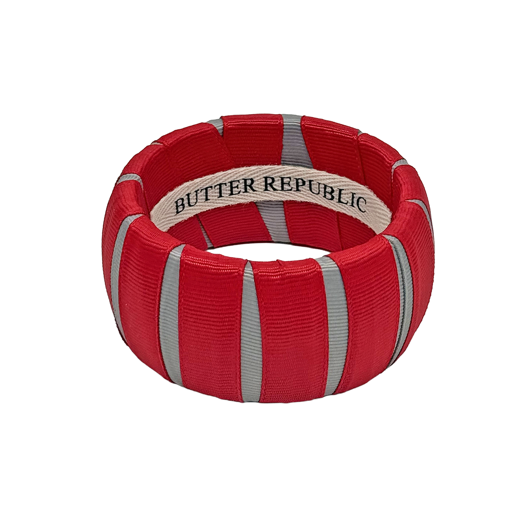 A scarlet and gray wide Butter Republic bracelet
