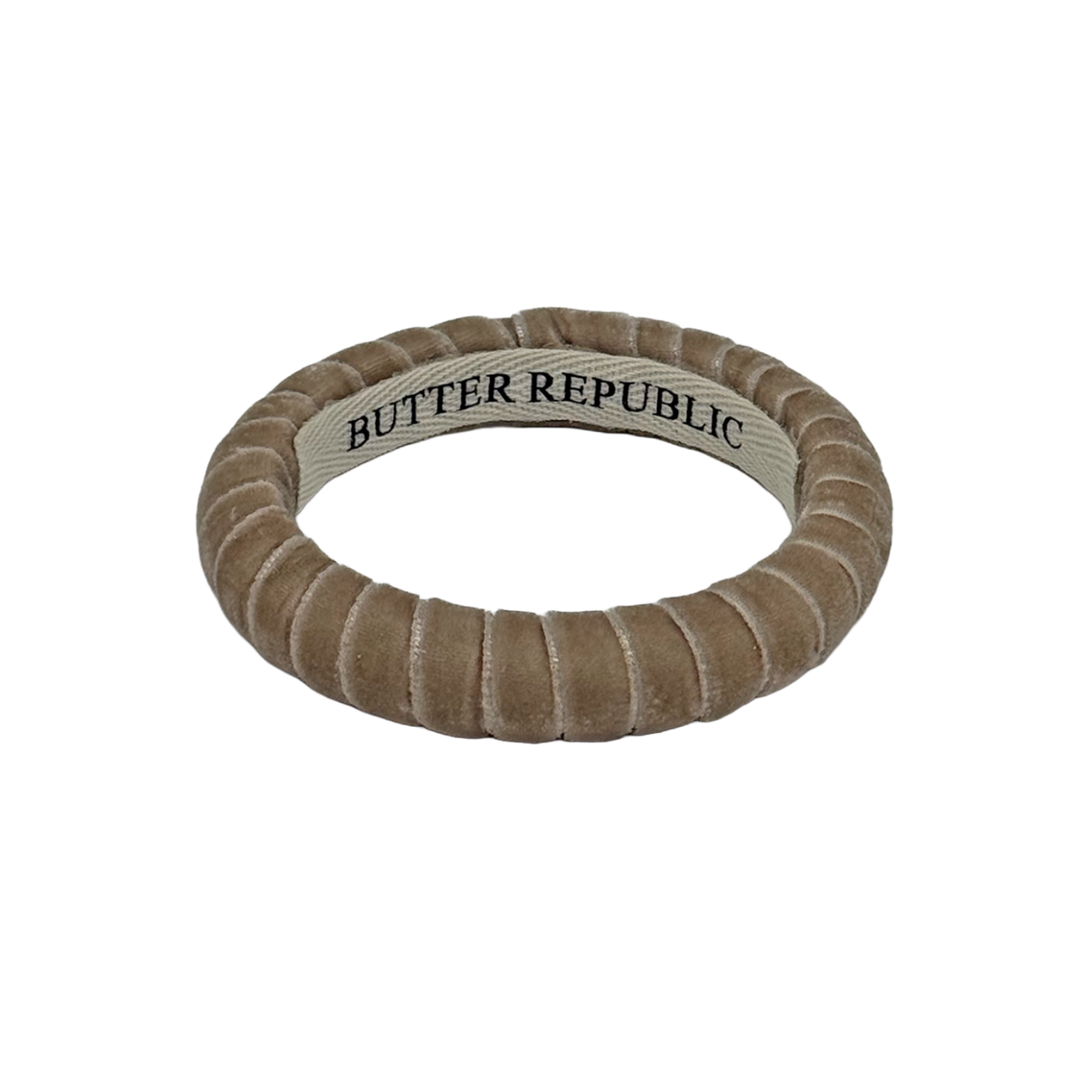 A velvet textured taupe Butter Republic bracelet